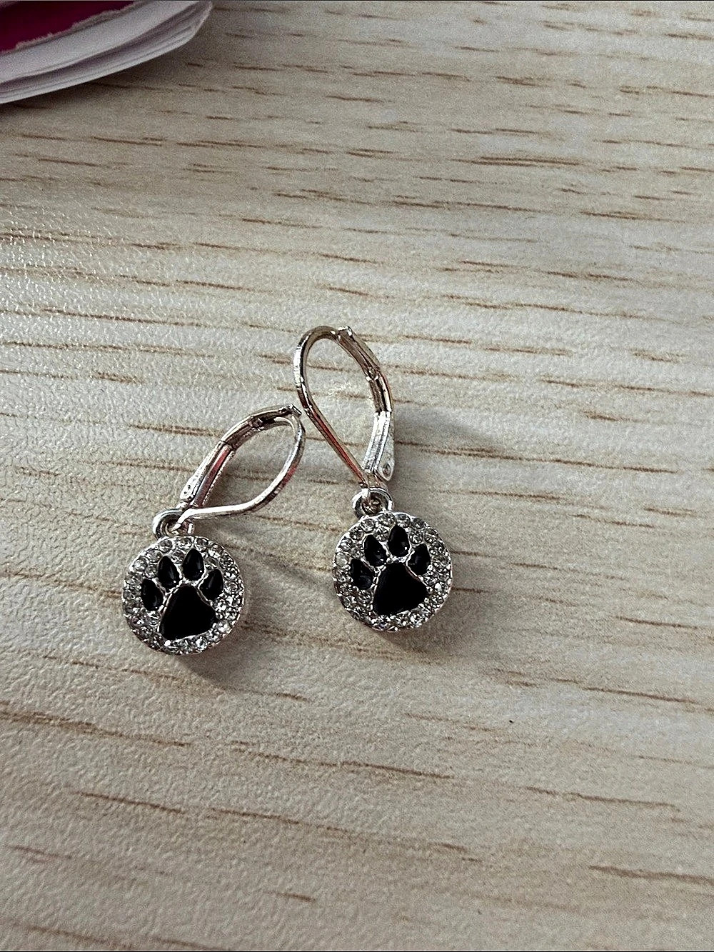 Paw Print Leverback Earrings in Silver & Black Like New